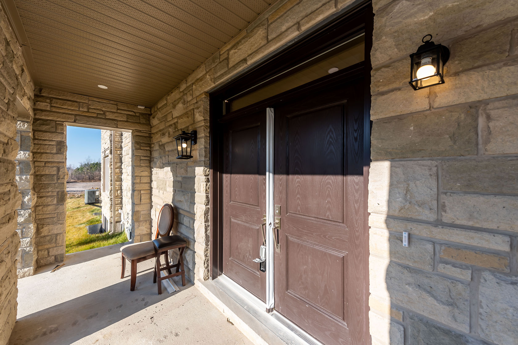 Completed Guelph home β entry feature wall